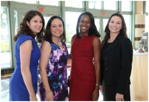 Photographed at the 2013 "Raise the Bar" fundraiser (L to R): Samantha Feuer, co-founder, Women's Foundation of Palm Beach County; Michelle McGovern, office of U.S. Senator Bill Nelson; Sia Baker-Barnes, Searcy Denney Scarola Barnhart & Shipley; and Nicole Atkinson, Gunster.